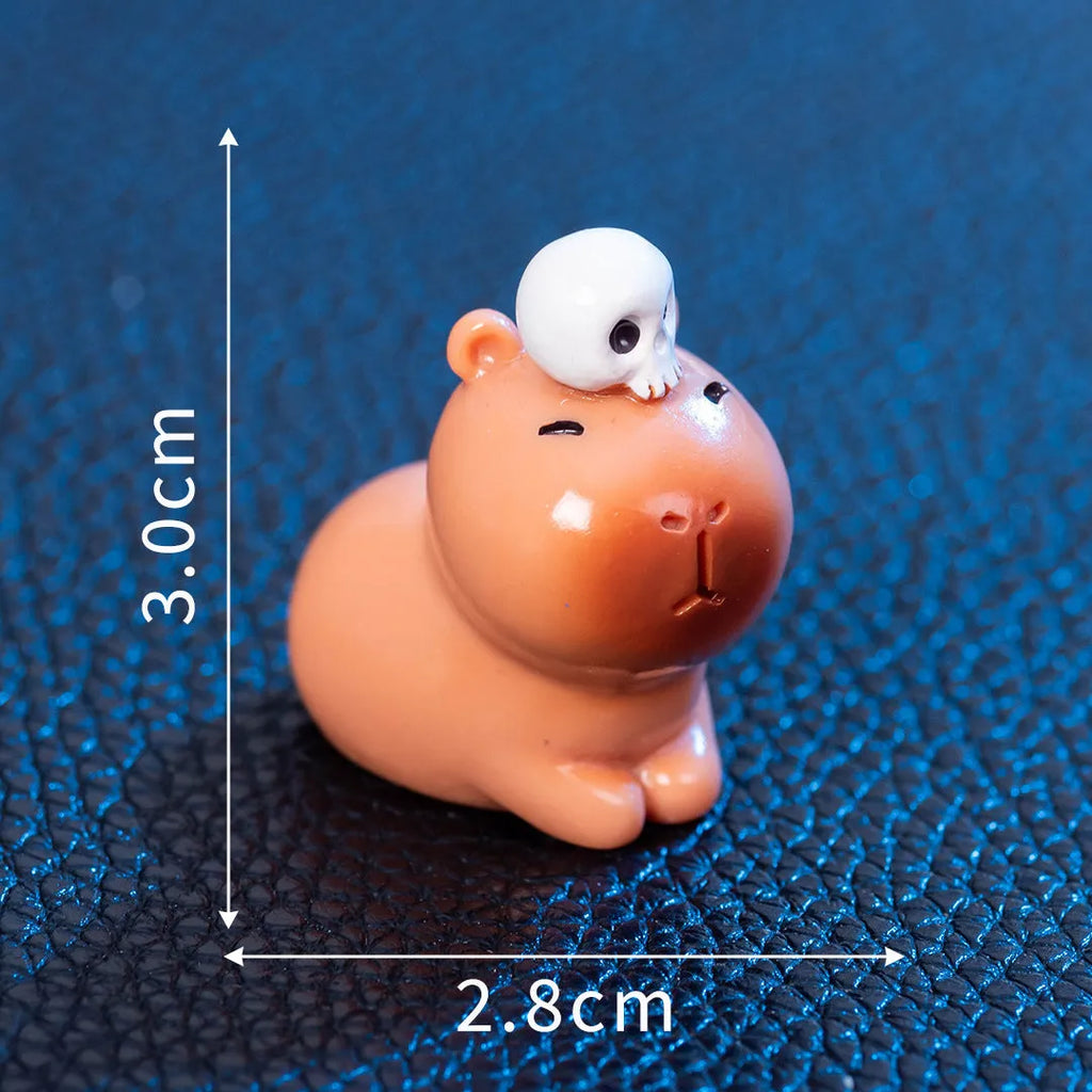 Halloween capybara resin figurine in one of eight designs like pumpkin or vampire.