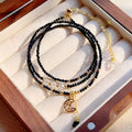 Blue gold sand stone cut women's bracelet with three interlocking rings in multi-layer design