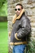 Men's brown synthetic leather fur coat with medium length and side pockets