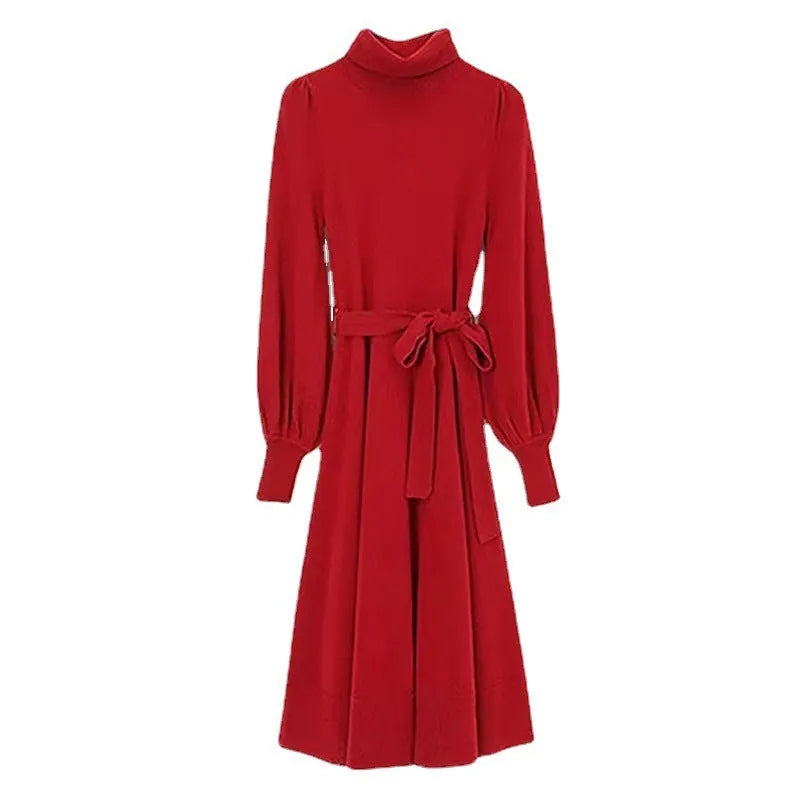 Rose red loose fit turtleneck knitted dress with long sleeves and a midi-length skirt.