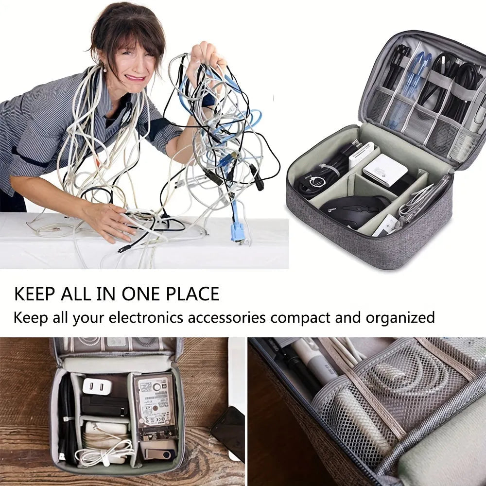 Black waterproof electronics travel organizer case open, showing mesh pockets, elastic loops and removable padded dividers.