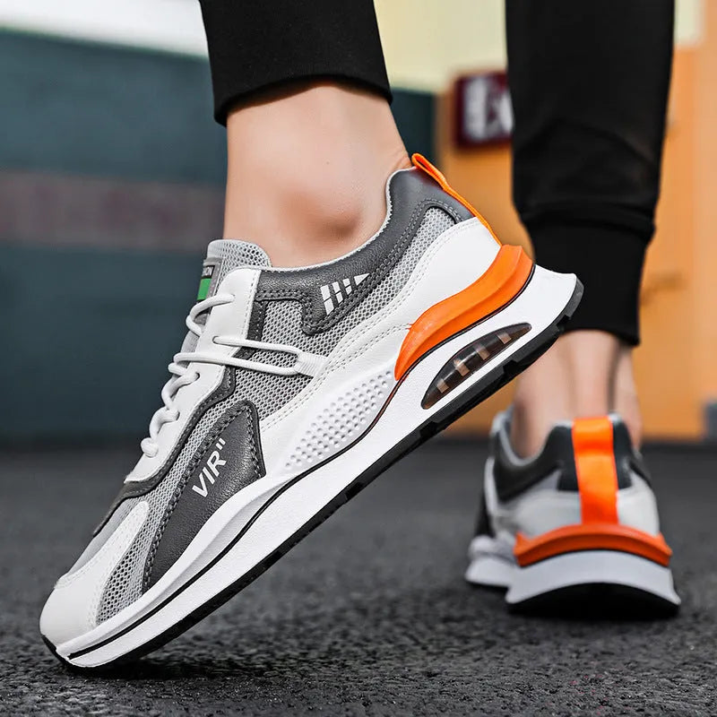Men's grey and black mesh casual running shoes with a lightning graphic and round toe.
