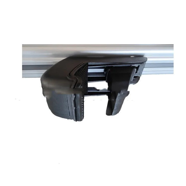 Alloy roof rack crossbars for a General Motors SUV, shown adjusted to length.