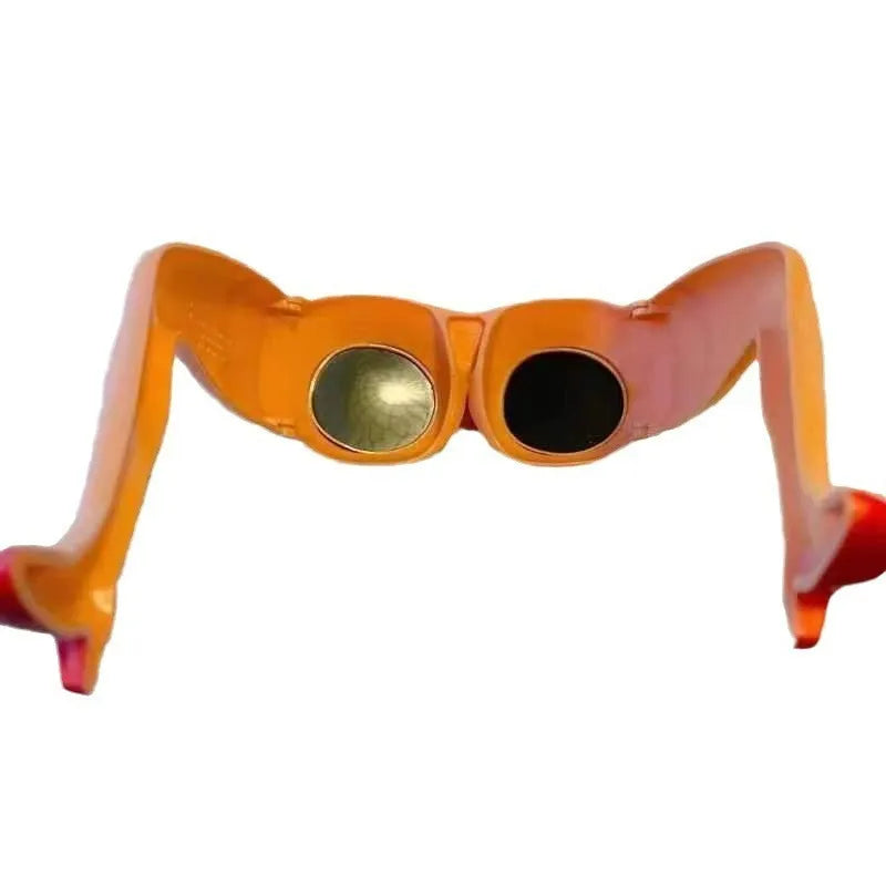 Orange novelty sunglasses with a leg and hip design on a white background.