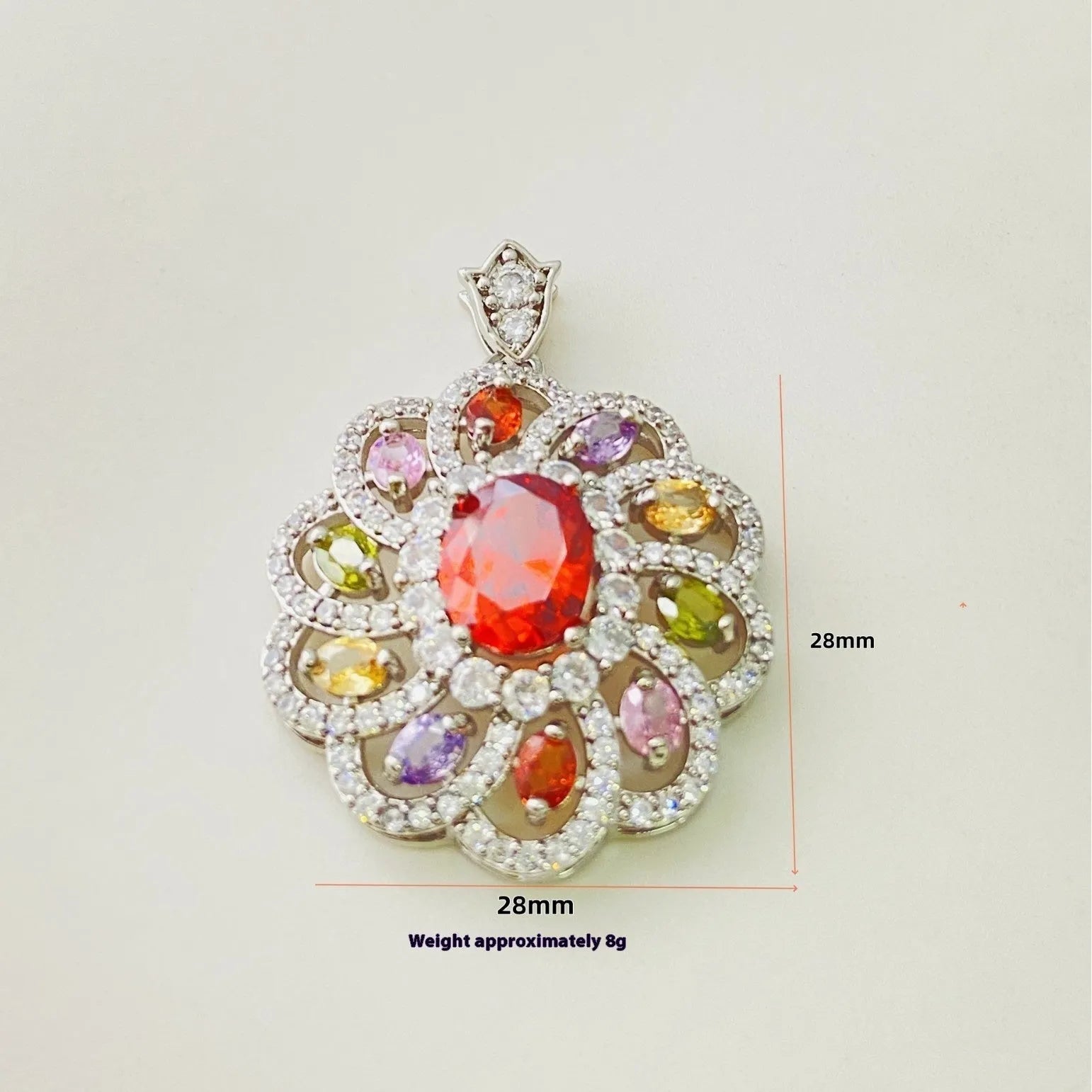 Close-up of a women's colourful zircon flower pendant necklace with a gold electroplated finish on a model.
