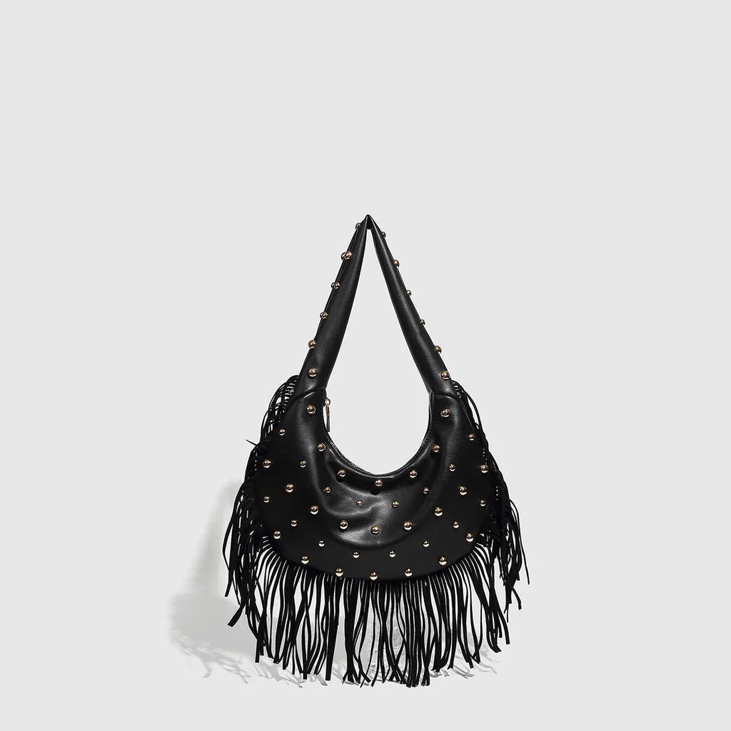 Retro black shoulder handbag with long tassel fringe and internal mobile phone compartment.