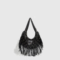 Retro black shoulder handbag with long tassel fringe and internal mobile phone compartment.