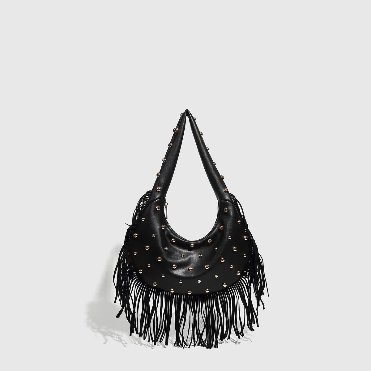Retro black shoulder handbag with long tassel fringe and internal mobile phone compartment.
