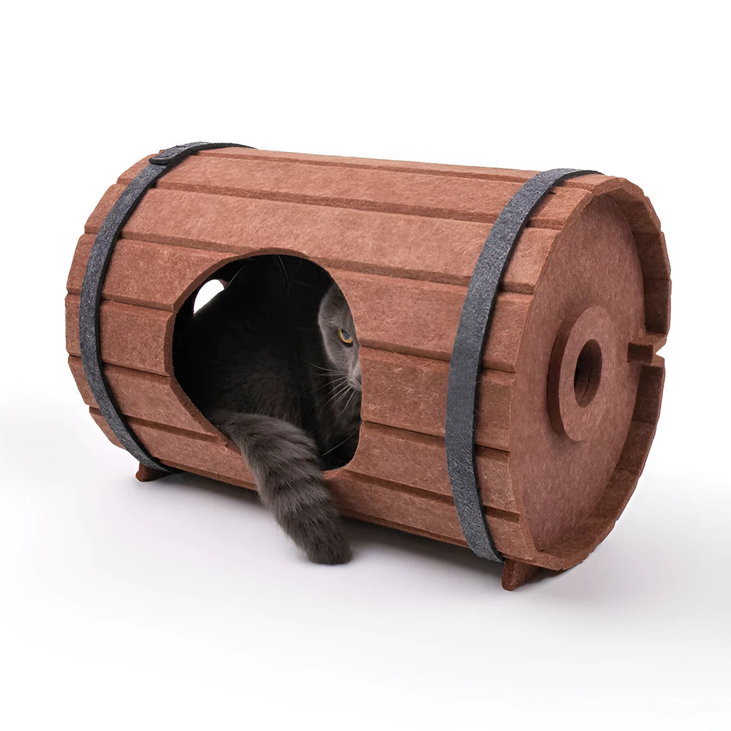 DIY assembled wine barrel shaped cat bed made from grey felt pieces with binding straps.