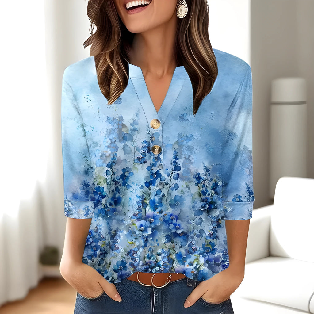 Women's loose fit V-neck t-shirt with a colourful 3D effect printed pattern on the front.