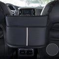 Genuine leather car seat storage bag with carbon fibre pattern, shown installed in a middle seat net pocket.