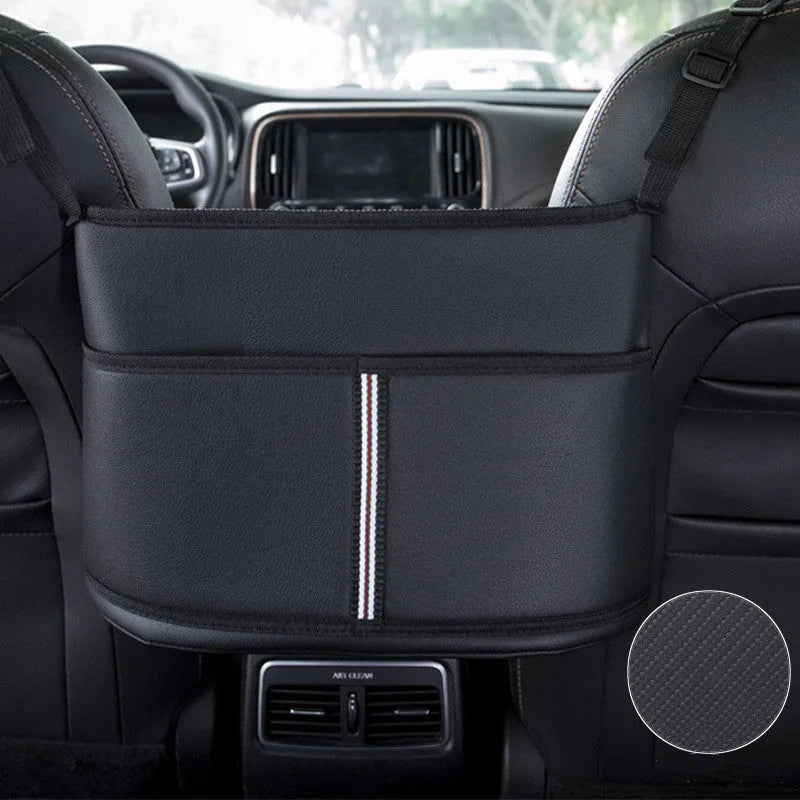 Genuine leather car seat storage bag with carbon fibre pattern, shown installed in a middle seat net pocket.