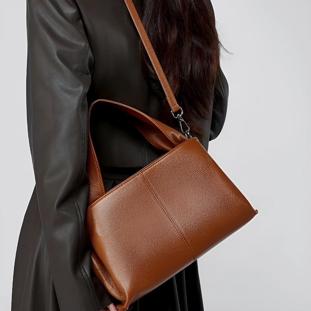 First layer cowhide messenger bag in horizontal square shape with double joint straps available in apricot black caramel and gray colours