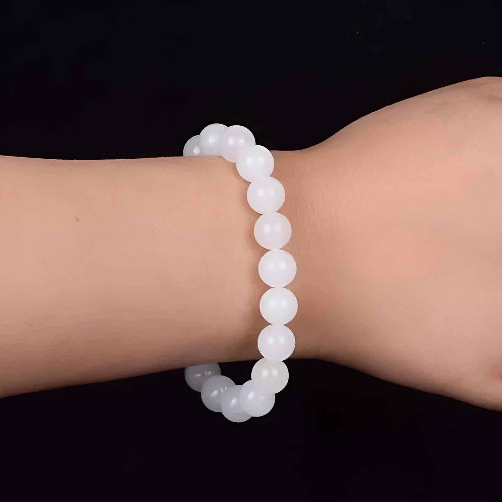 Hotan white jade goat fat round bead bracelet 10mm Hetian jade unisex national style on light background