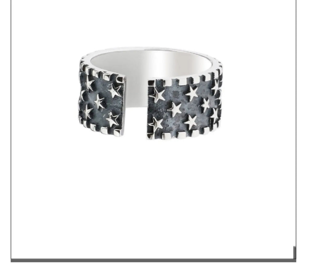 Adjustable sterling silver ring with geometric five-pointed star pattern
