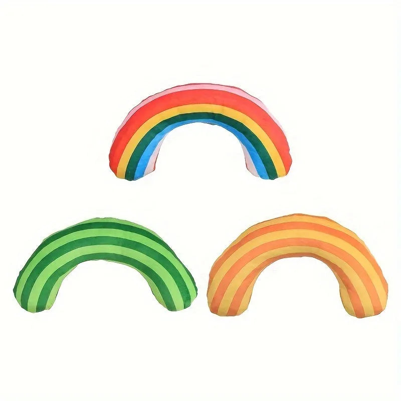 Green, rainbow, and yellow striped plush cat pillow with attached noise toy, measuring 23cm by 20cm.