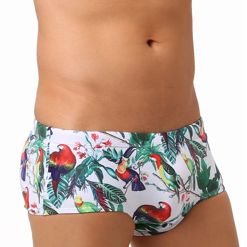 Men's floral and bird print swimming trunks in nylon fabric with elasticated waistband