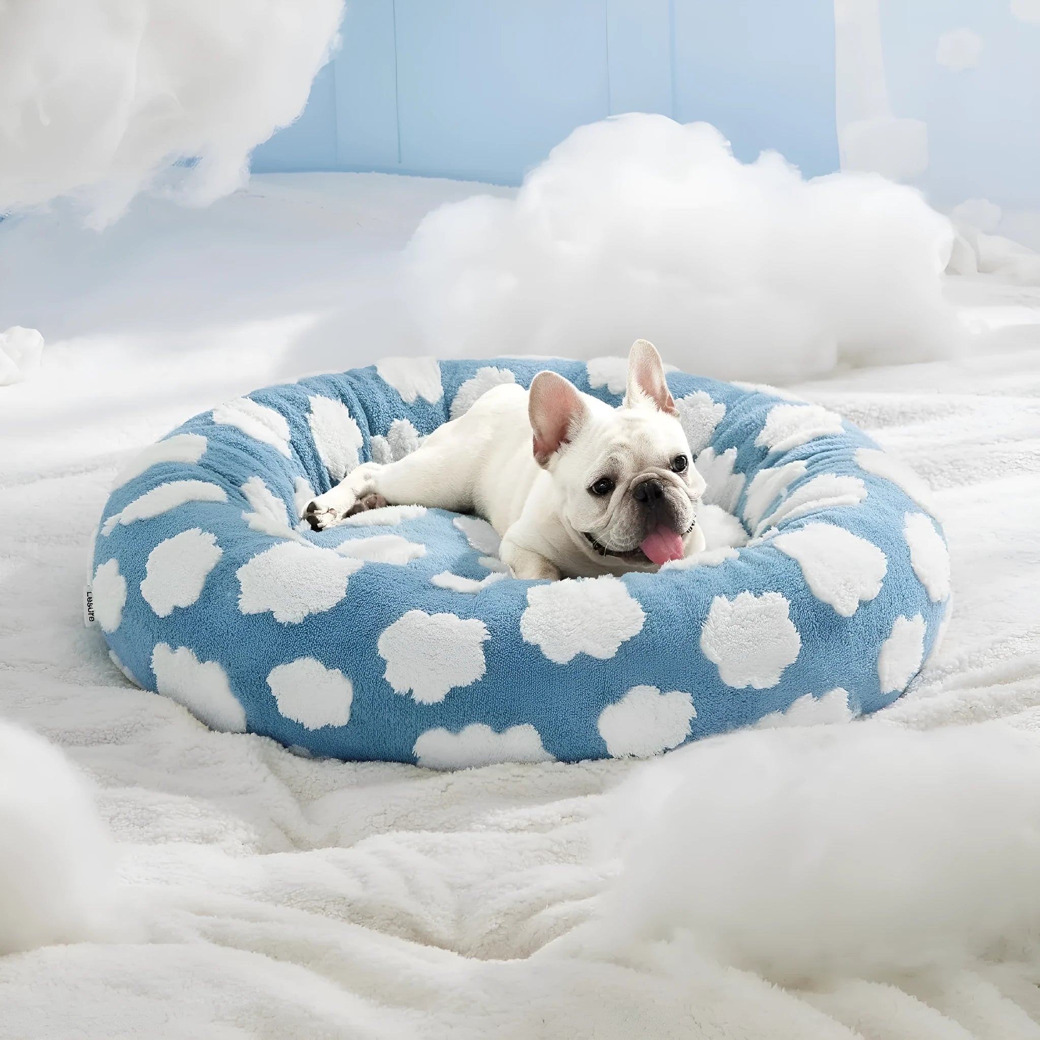 Round blue and white plaid dog bed with plastic base in 60cm size for medium dogs