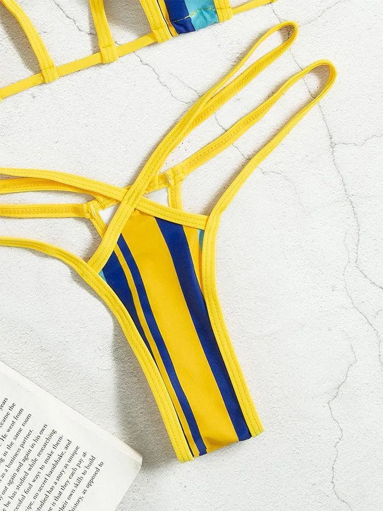Yellow women's one-piece swimsuit with a neck-hanging strap and backless hollow design.
