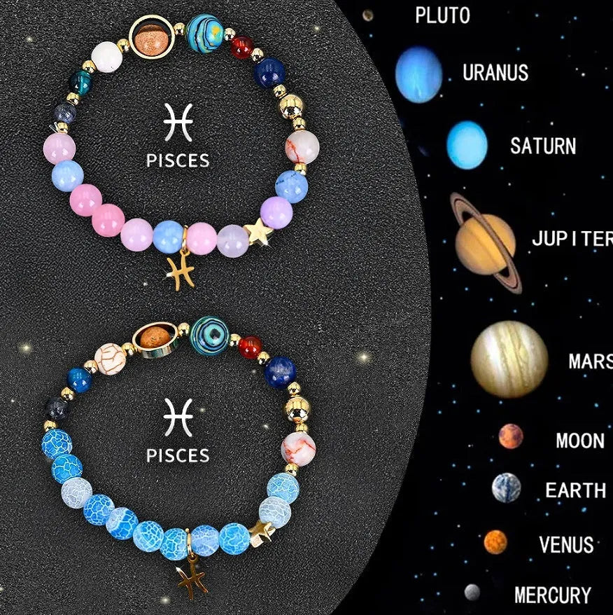 Two natural stone beaded bracelets with zodiac sign charms on a neutral background