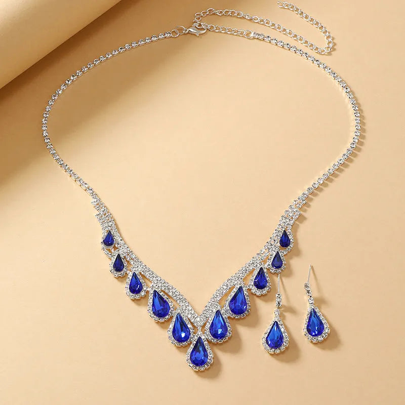 Royal Blue White K alloy jewellery set with a regular chain necklace and earrings on display