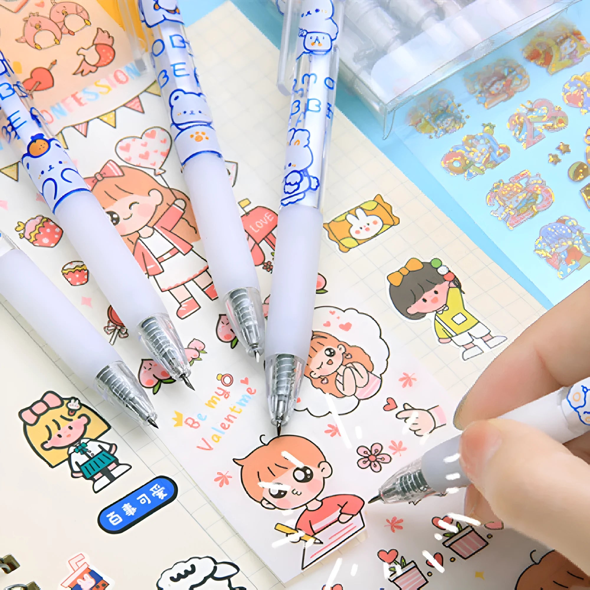 A six-pack of novelty press pen knives showing cute cream bear, rabbit, and other character designs.