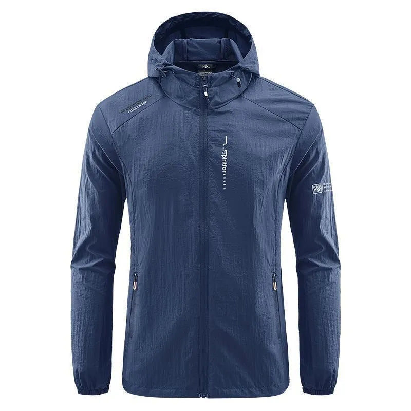 Man wearing a lightweight grey hooded nylon summer jacket for sun protection.