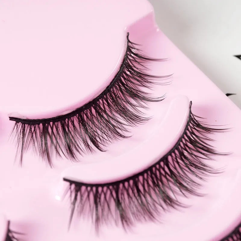 Set of manga style false eyelashes showing natural slim length styles 007, 008, and 009 on black plastic bands.