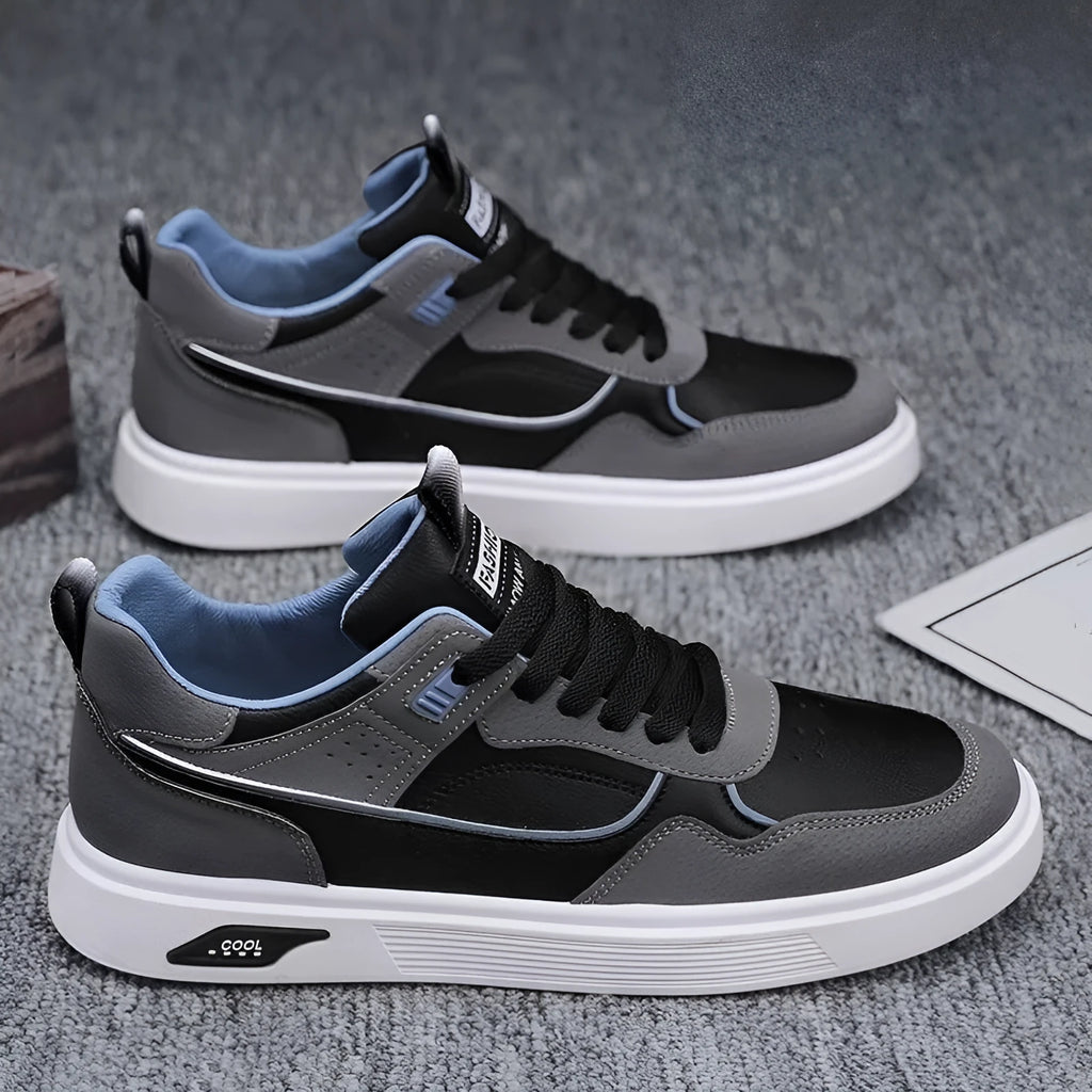 Men's low-top canvas board shoes in black with mesh lining and round toe