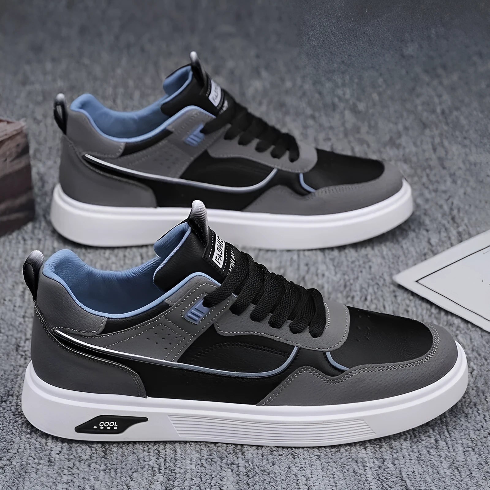 Men's low-top canvas board shoes in black with mesh lining and round toe