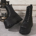 Women's white retro platform martin boots with patchwork detail and a side zip.