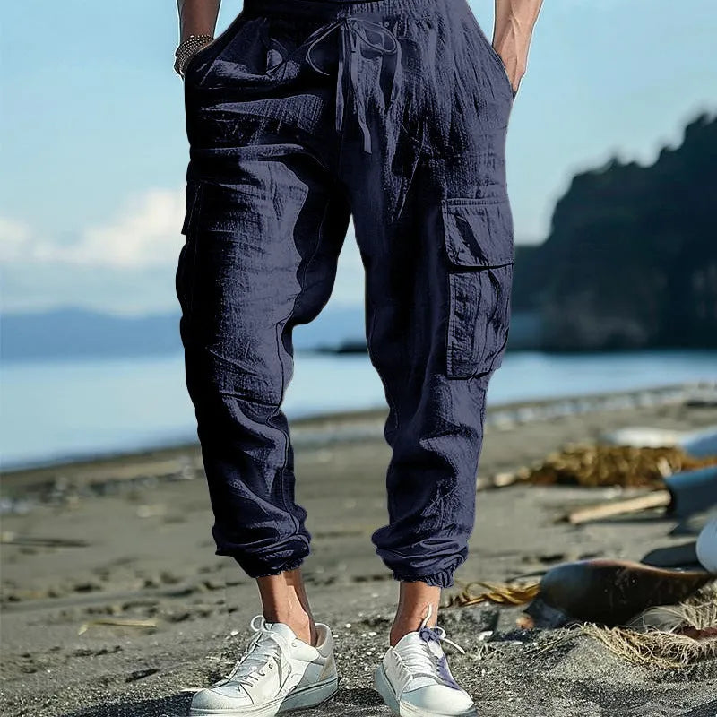 Men's linen casual trousers with elastic drawstring waist and ankle-tied cuffs in solid colours