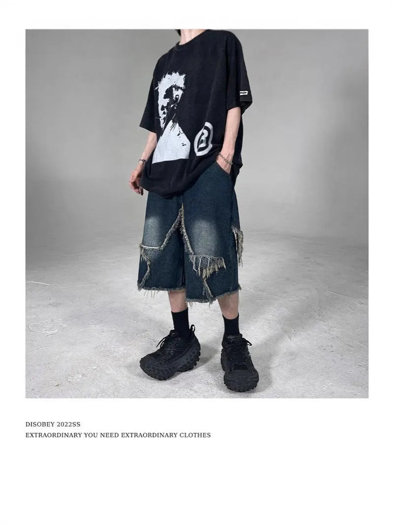 Men's blue denim shorts with frayed five-pointed star detailing and loose fit for summer casual wear