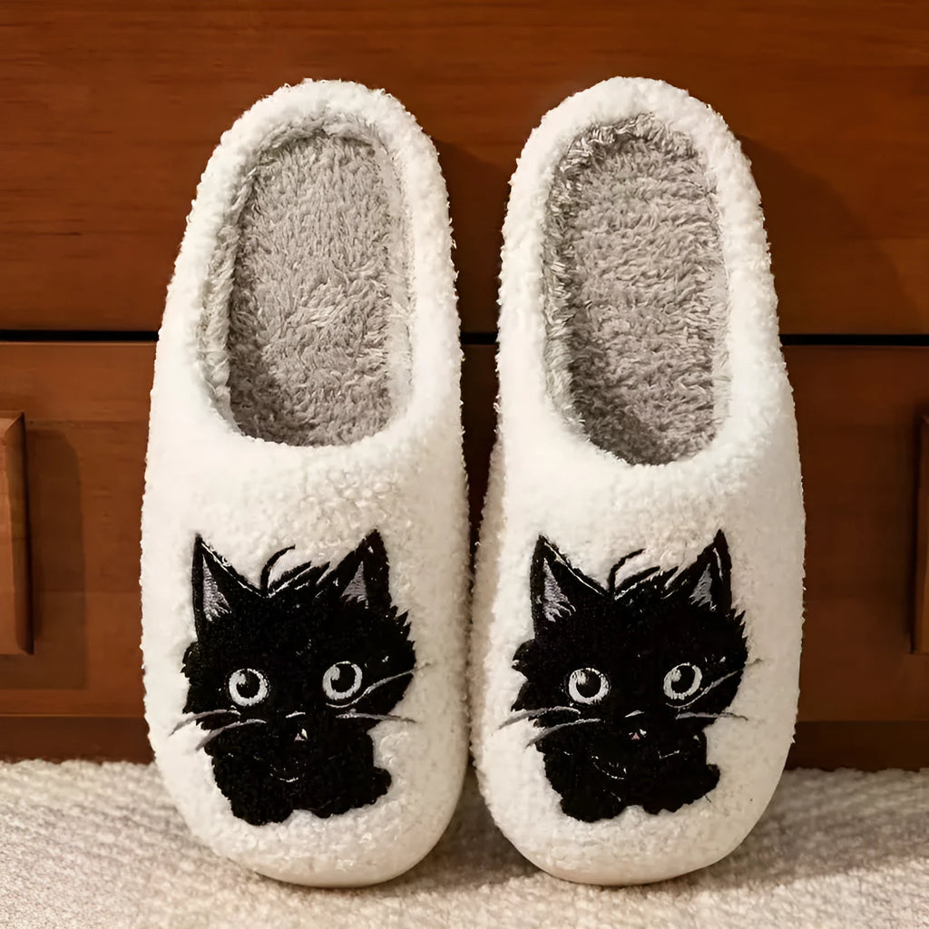 White cartoon Black Beard Cat couple slippers with plush fabric and a non-slip sole.