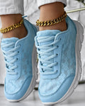 Women's white canvas casual running shoes with flat soft sole on a plain background
