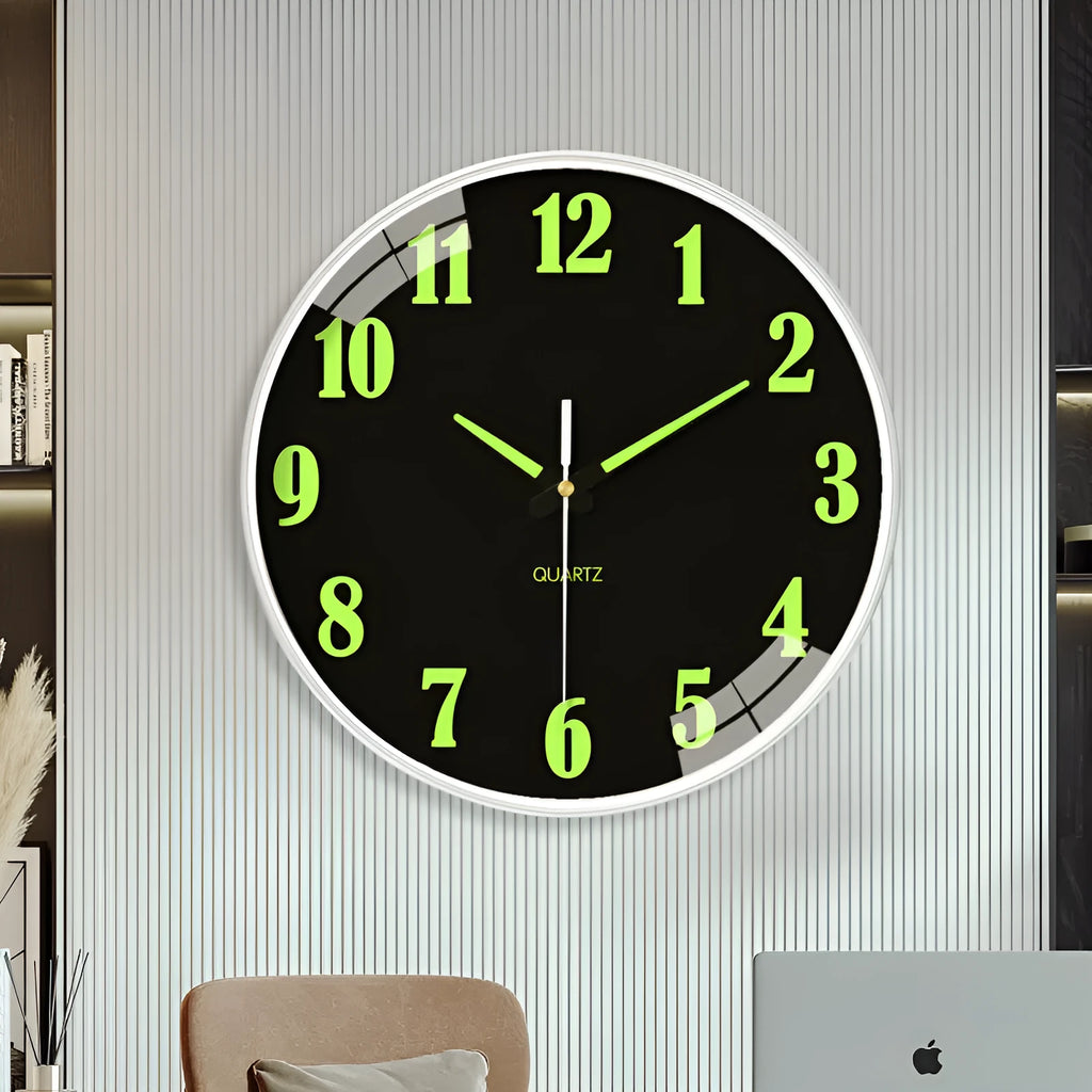 8 inch modern wall clock with luminous hands and black numerals on a light dial.