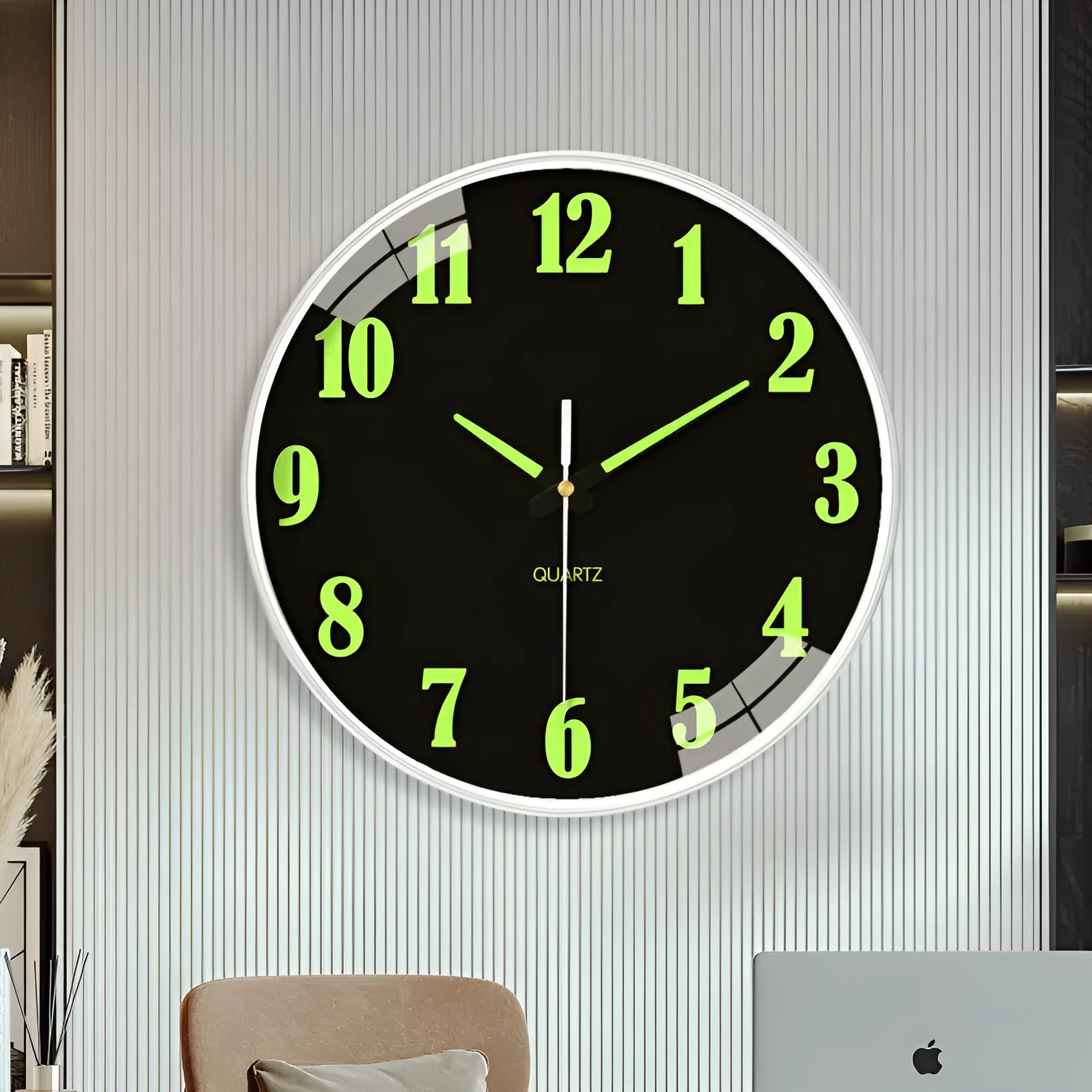 8 inch modern wall clock with luminous hands and black numerals on a light dial.