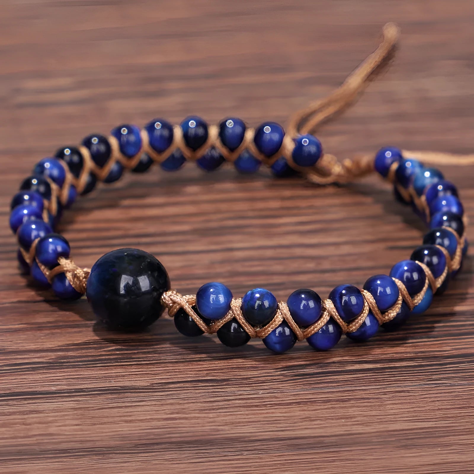 Handmade woven pull bracelet with geometric tigereye beads in blue or amethyst colour
