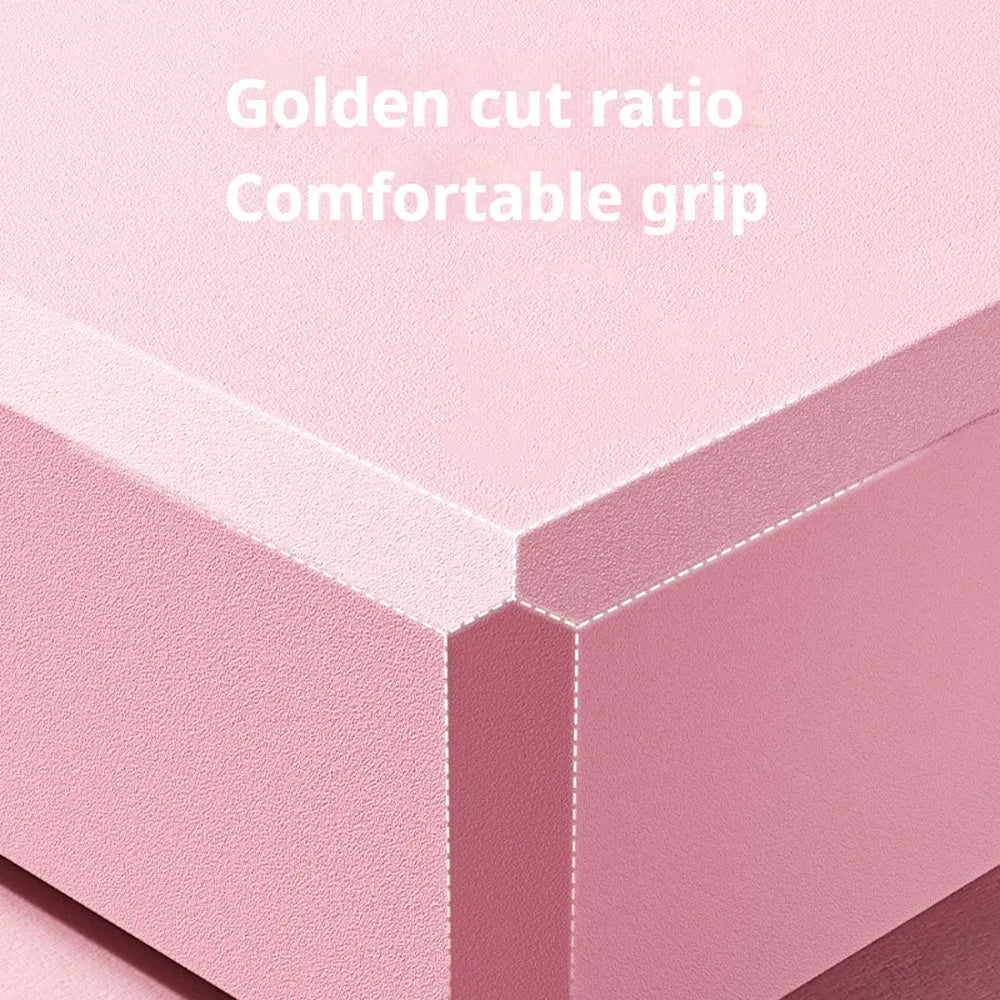 Solid colour EVA foam yoga block with hexagonal ridges, shown next to tape measure showing 23cm length