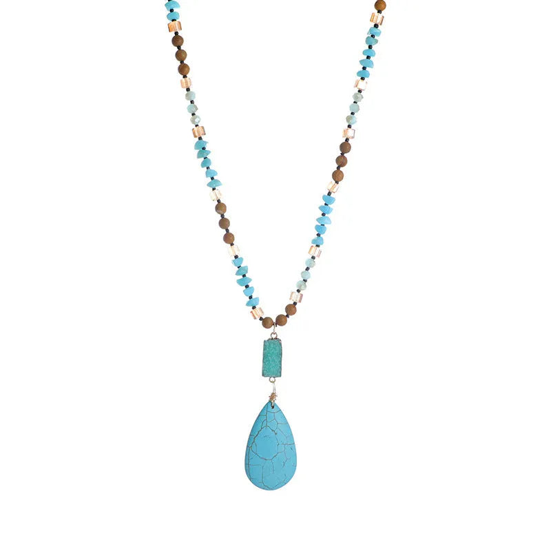 Turquoise blue water drop shaped pendant necklace with ball bead chain and geometric design elements