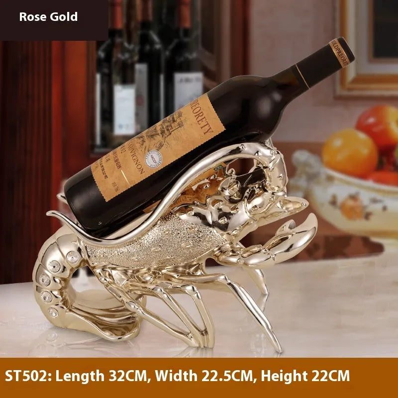 Lobster-shaped wine rack ornament in rose gold or silver metallic finish on tabletop