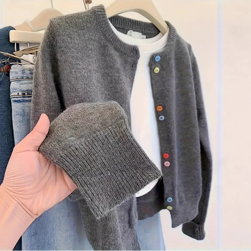 Dark grey women's polyester cardigan with buttons and long sleeves on a hanger