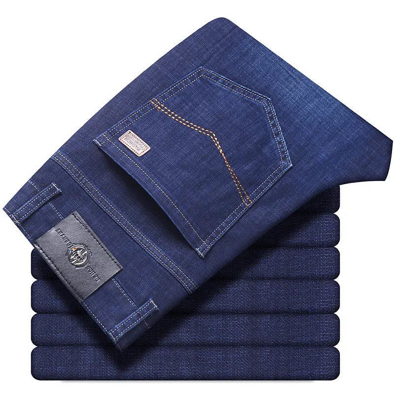 Women's straight-leg stretch jeans in mid-waist style with zip fly, available in black and blue
