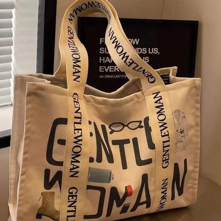 Large canvas women's tote bag with printing, shown in different colour and pattern style options.
