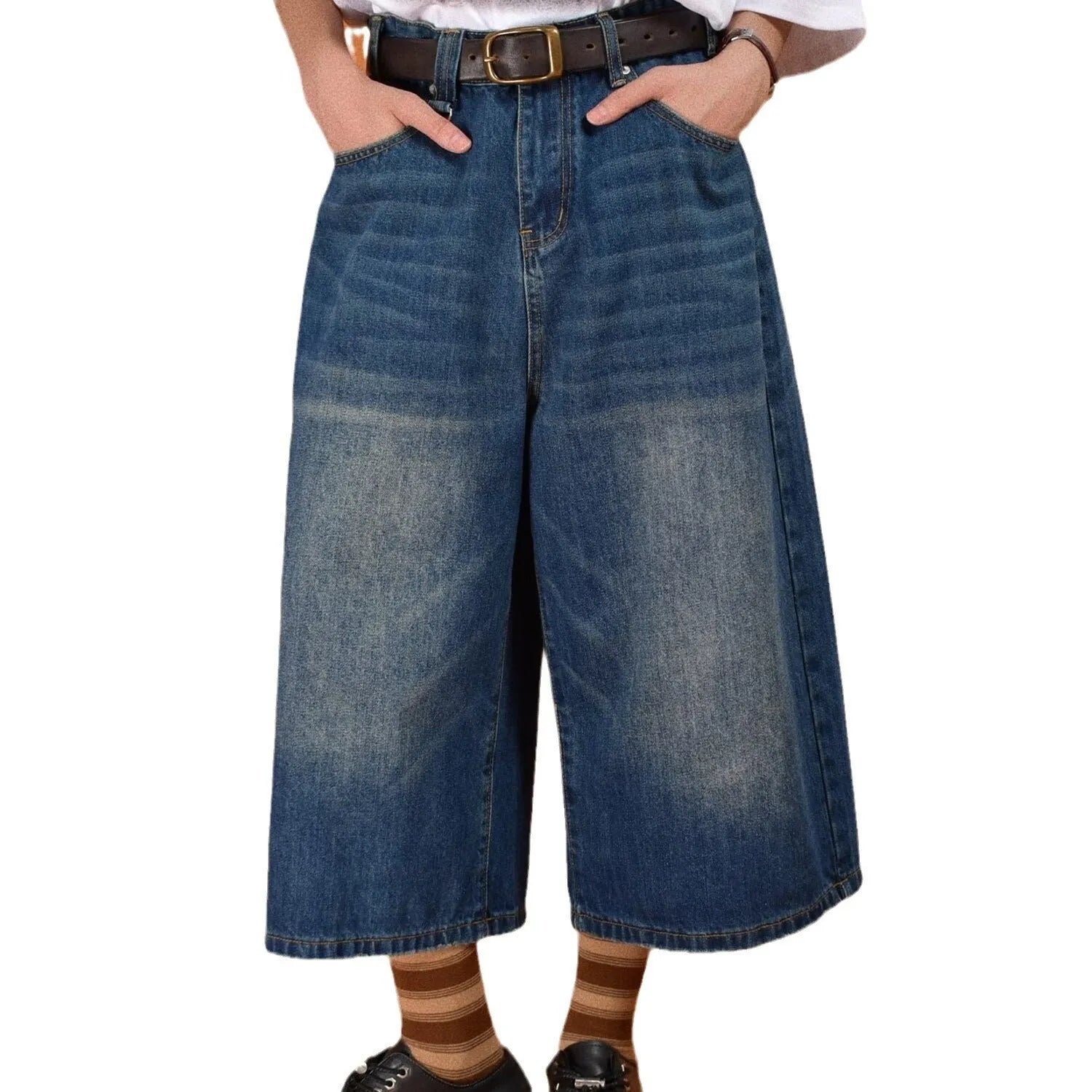 Men's blue loose straight denim shorts for summer on a plain background.