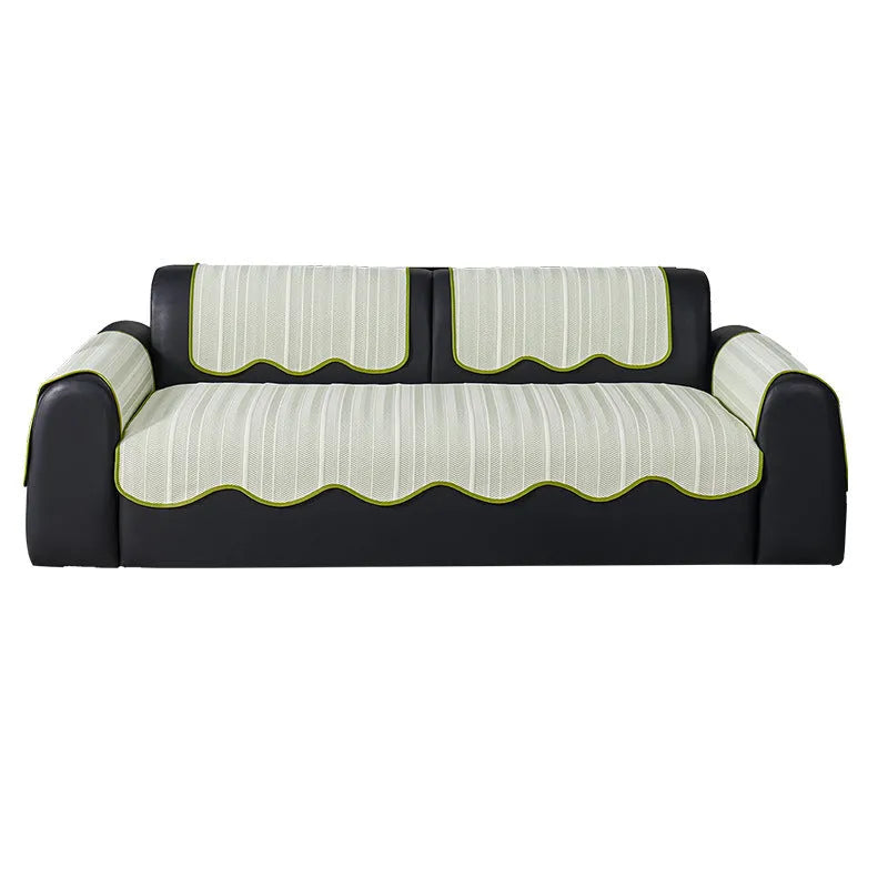 Ice silk fixed non-slip sofa cover in a special pattern, shown in jelly green colour on a couch.
