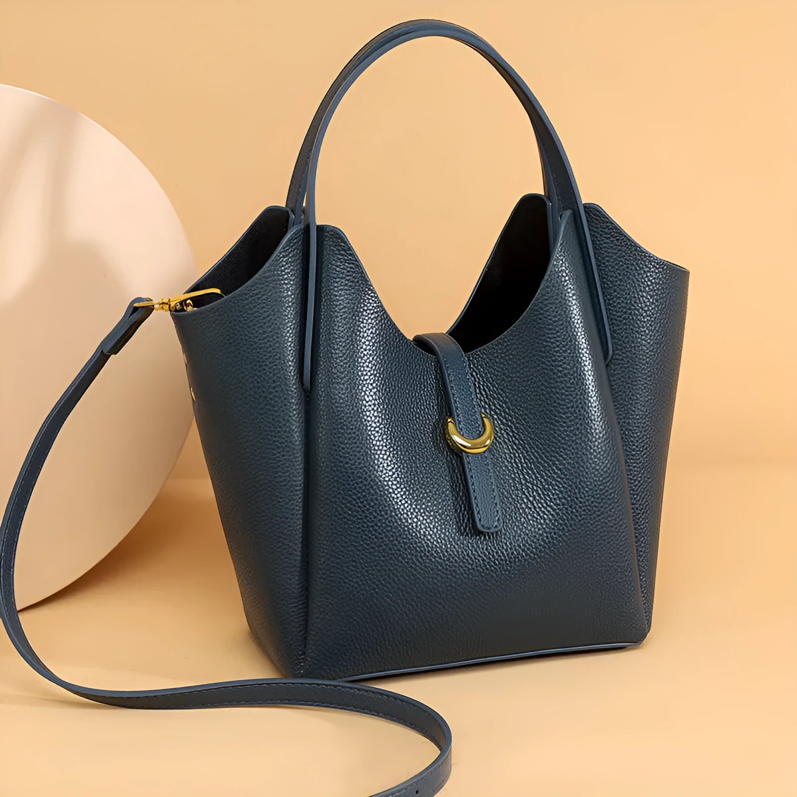 Genuine leather women's hand holding bucket bag in retro style with file bag interior