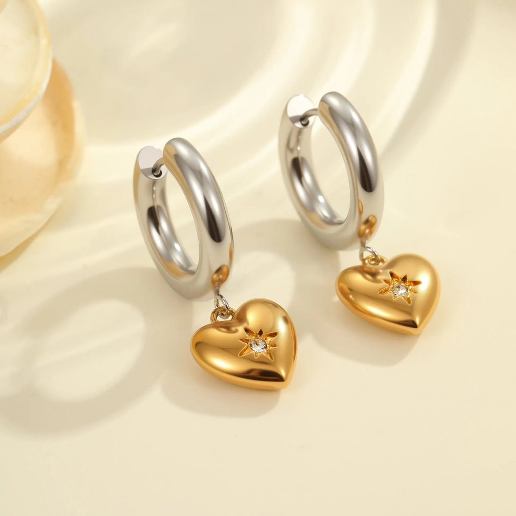 Pair of 18K gold plated stainless steel earrings featuring a Christmas tree design shaped into a heart.