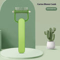 Green and grey dog detangling comb with stainless steel teeth on a PP plastic handle, shown in small and large sizes.