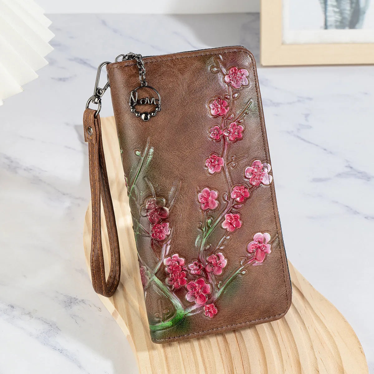 Chinese style handbag with embossed floral pattern in retro design with zipper closure